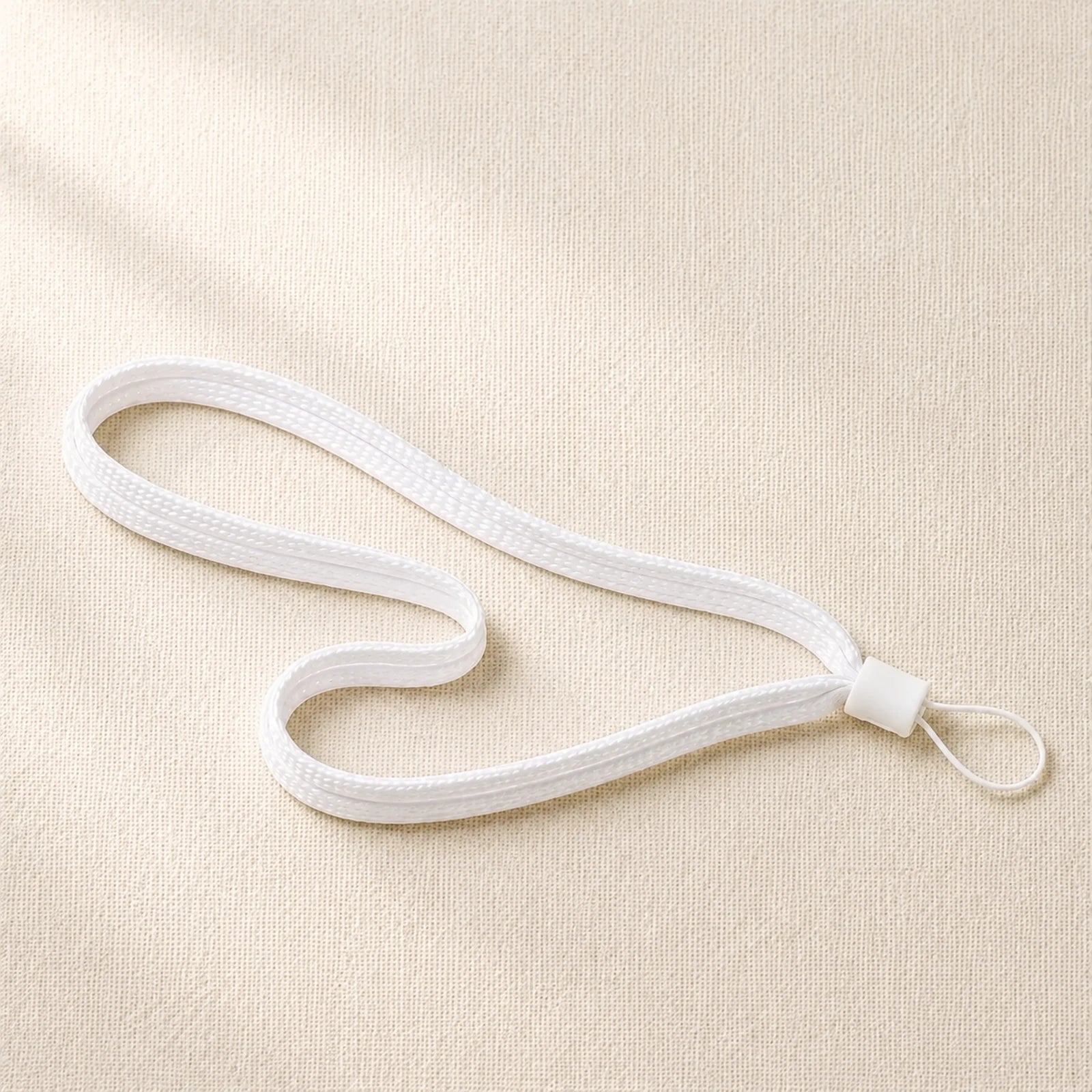 White carrying cord for the Presence Anchor.