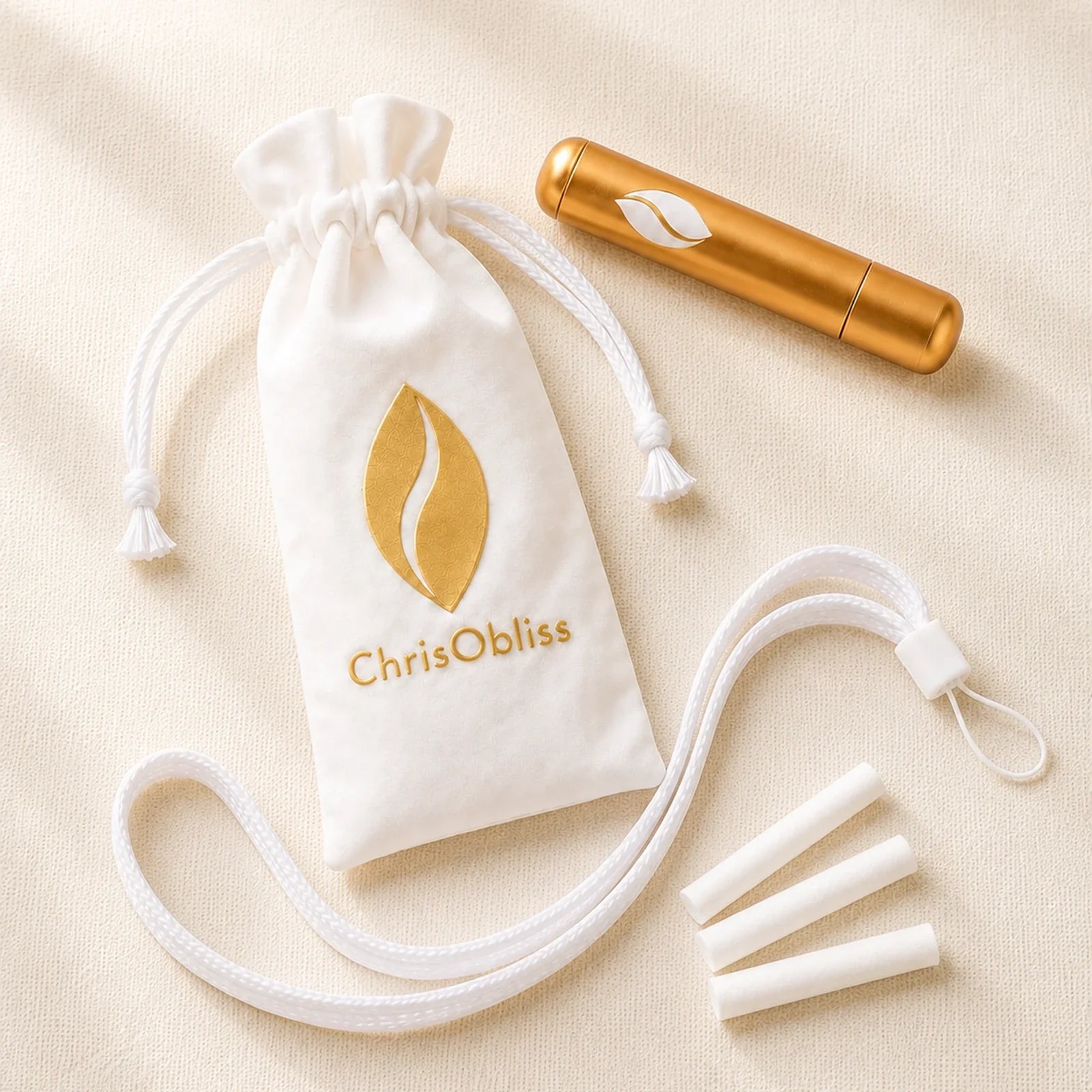 The Presence Anchor Single pack: gold inhaler, white pouch, carrying cord and three dry cotton sticks.