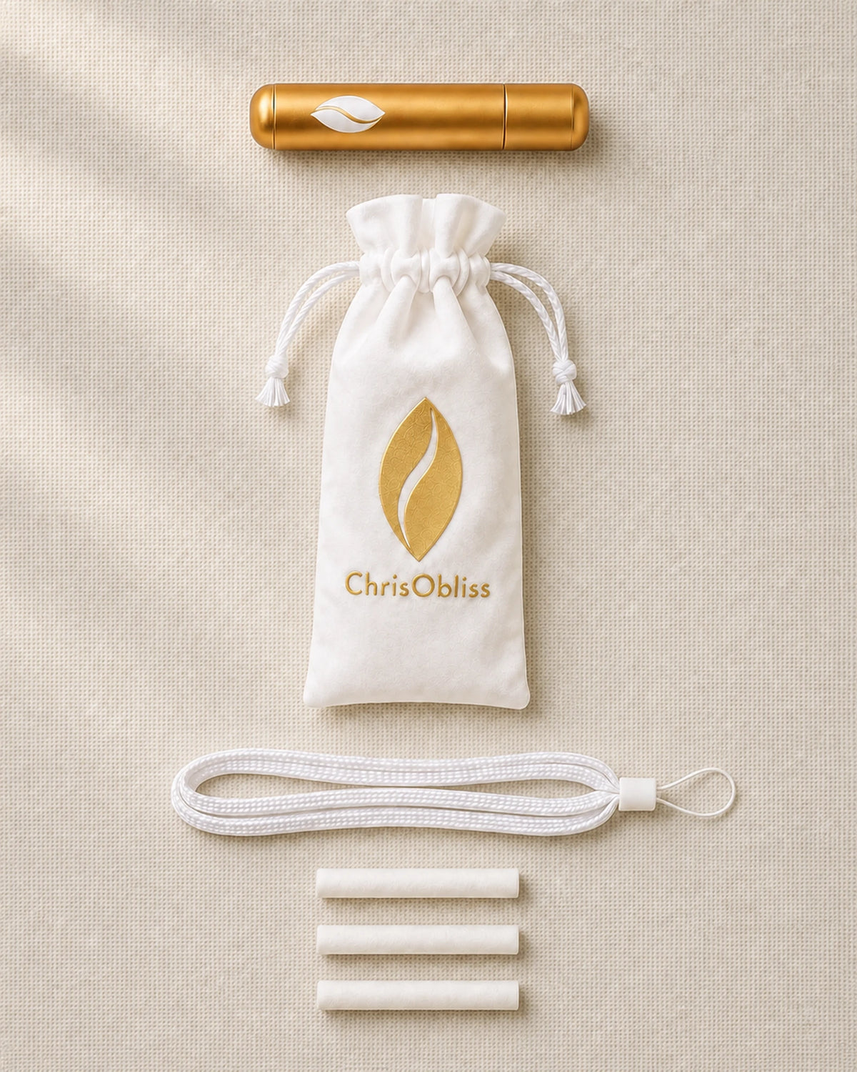 Everything in a Presence Anchor pack: gold inhaler, white pouch, carrying cord and three dry cotton sticks.