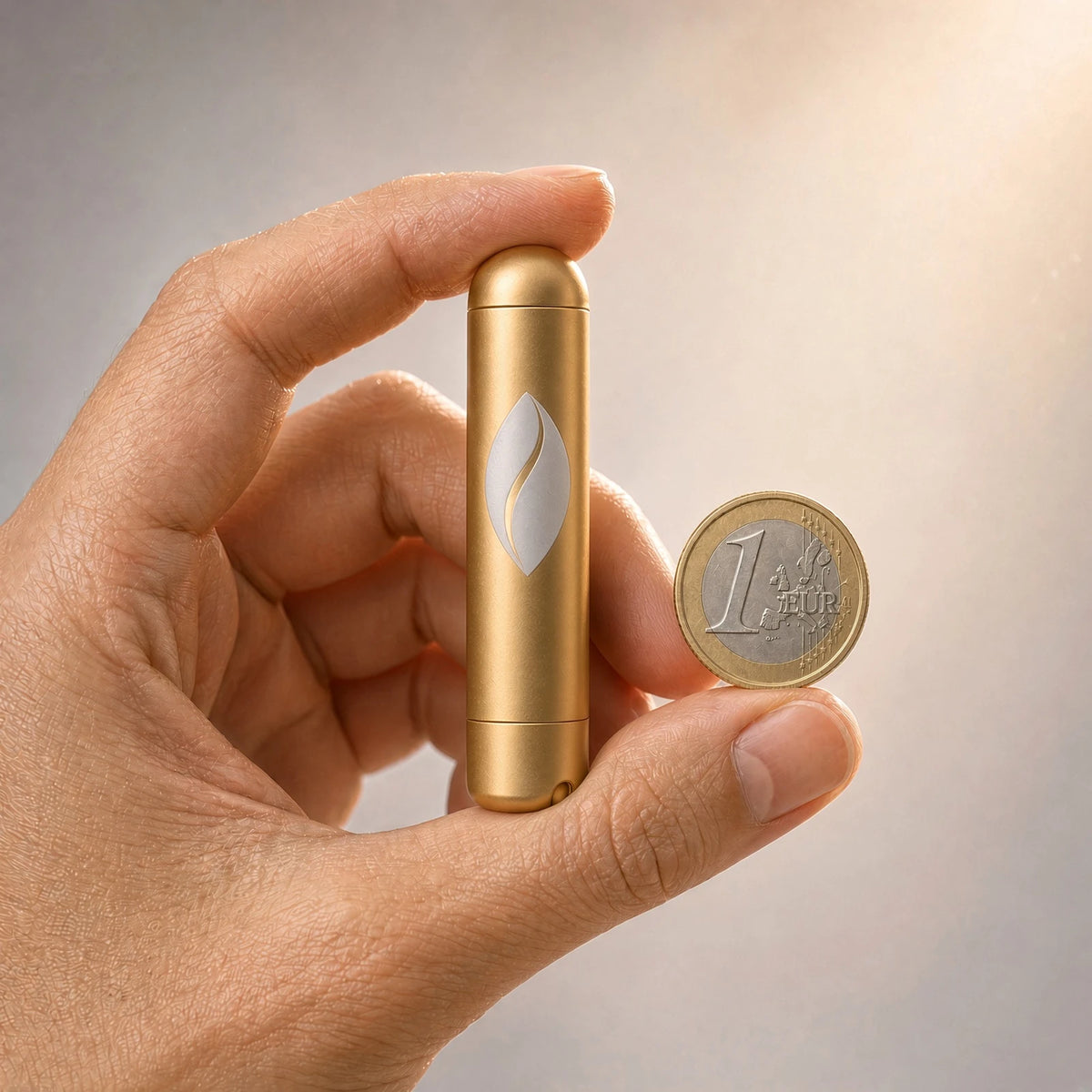 ChrisObliss Presence Anchor true to scale — held beside a 1 Euro coin